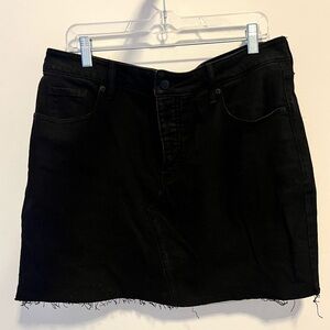 Black denim button fly mini skirt
